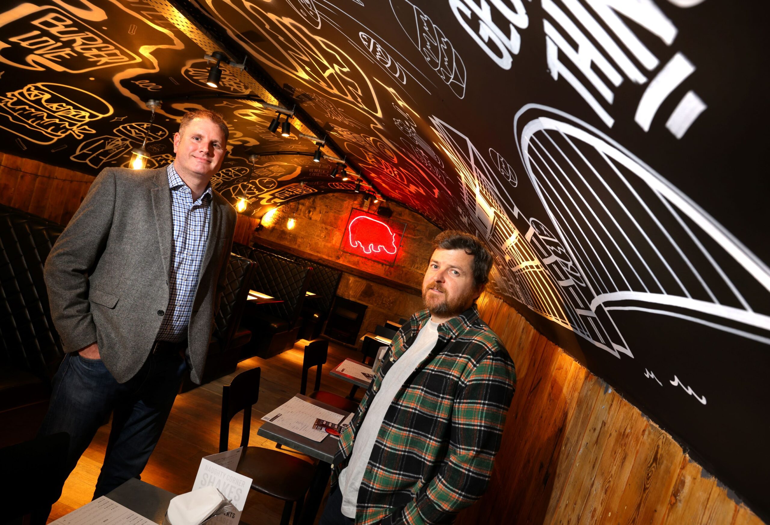 (left) Paul Gainford of RMT Accountants and Business Advisors with Fat Hippo founder Michael Phillips