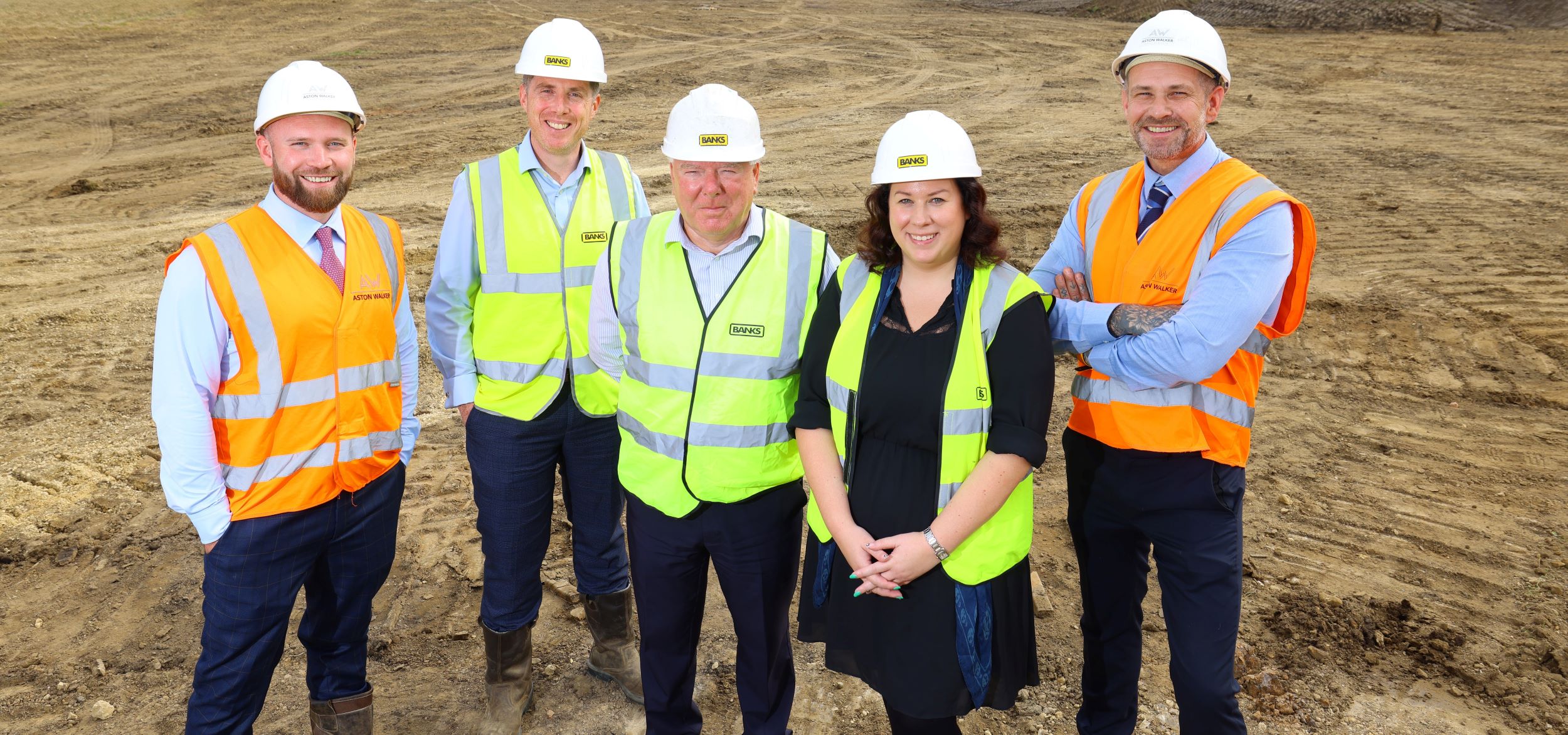(far left) Nathan Walker and (far right) Davie Aston of Aston Walker Developments, with (from centre left) Banks Homes managing director Russ Hall, Banks Group commercial manager Brian Hunter and Banks Group executive assistant Lucy Hinds