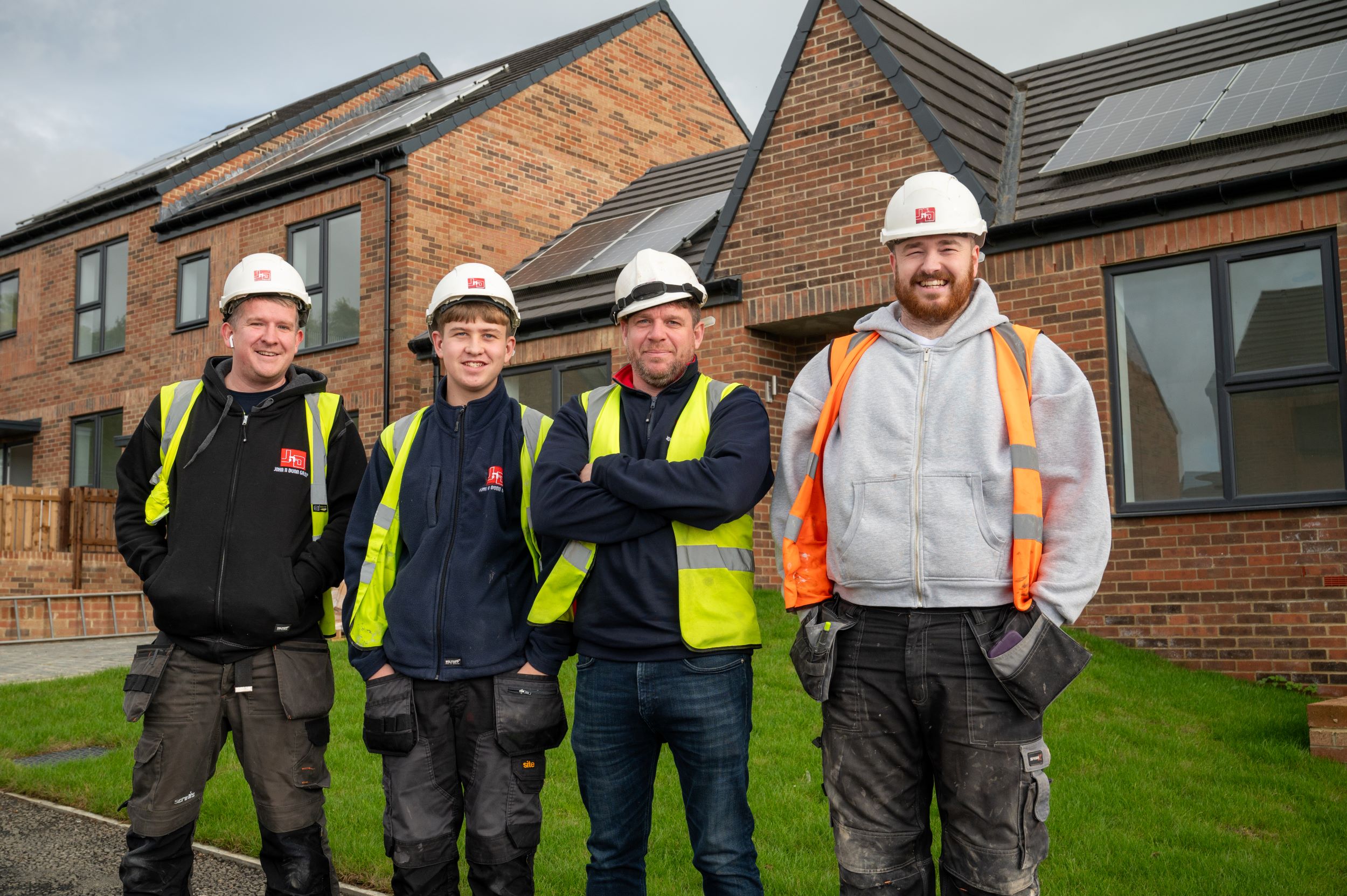 (one from left) second year apprentice Jack Joyce with (from left) electrical adult trainee Phil Colley, contract manager Adam Robson and qualified plumber Rory Wilson