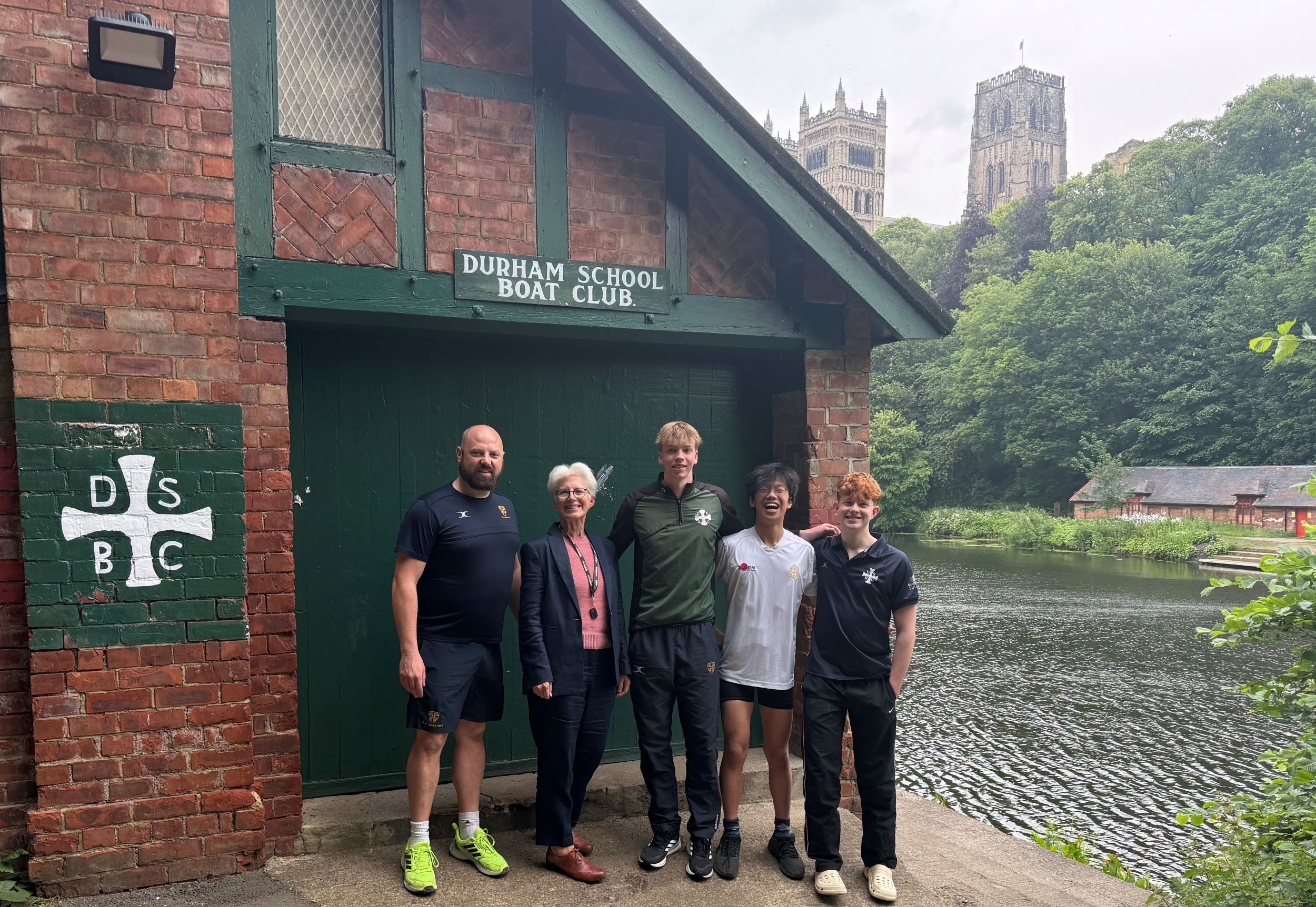 The accompanying image shows (from left) Durham School's head of rowing Eddie Bryant, Banks Group community relations manager Kate Culverhouse and crew members from Durham School Boat Club