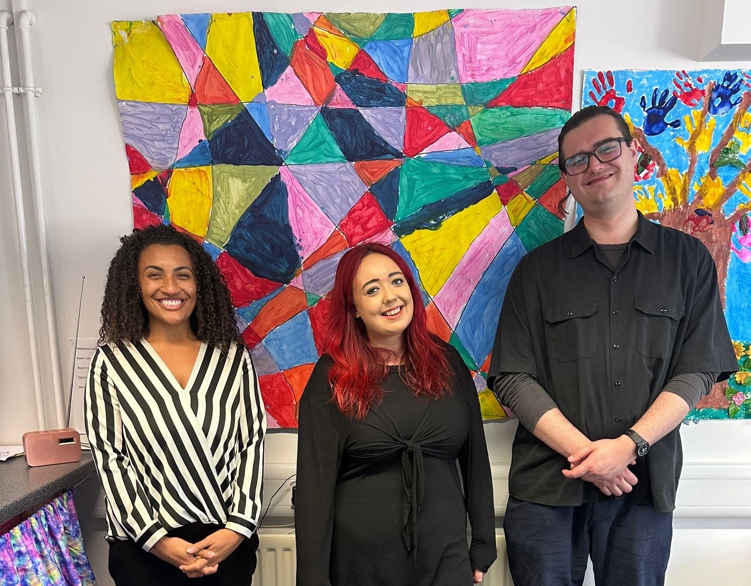 (from left) Jamilah Hassan of the Banks Group with Layla Priest and Greg Stitt of Impact Family Services