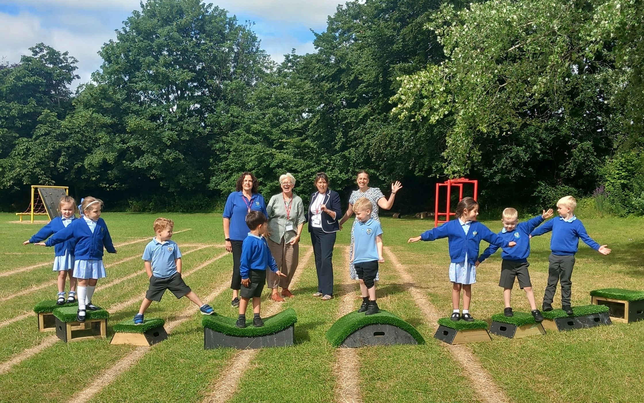 Some of the pupils at Sedgefield Primary School trying out their new play equipment, along with (back, from left) teaching assistant Lucy Carmichael, Kate Culverhouse of the Banks Group, Margaret Eadsforth of the Sedgefield Primary School PTFA and head teacher Leanne Collings
